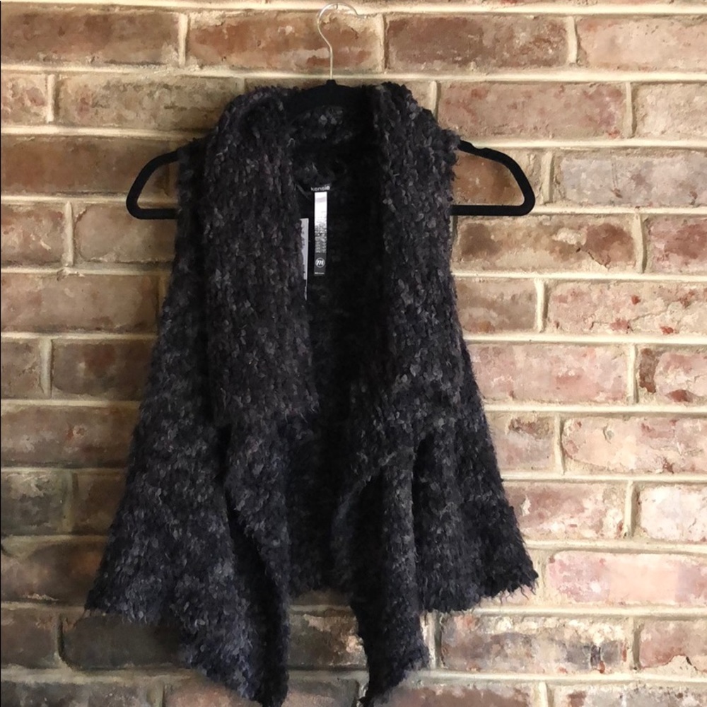 Open sleeveless sweater